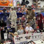 People look at Halloween displays at a Lowe's Home Improvement store in East Rutherford, NJ, on August 30, 2023.